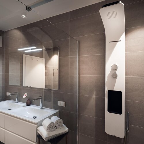 Modern bathroom with double sink vanity and glass shower