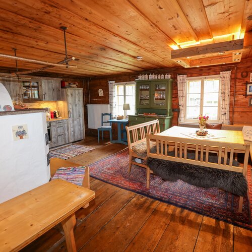 Cozy rustic cottage dining area with wooden beams